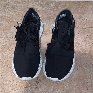 Slightly worn Adidas sneakers in mint condition